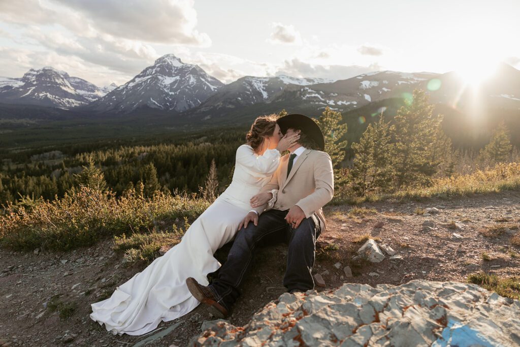 Golden hour bridal portraits at Two Medicine Overlook following an intimate wedding ceremony at Pray Lake photographed by Sydney Breann Photography