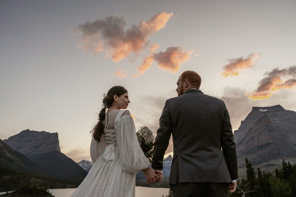 An adventurous Glacier National Park honeymoon bridal session at Sun Point photographed by Sydney Breann Photography