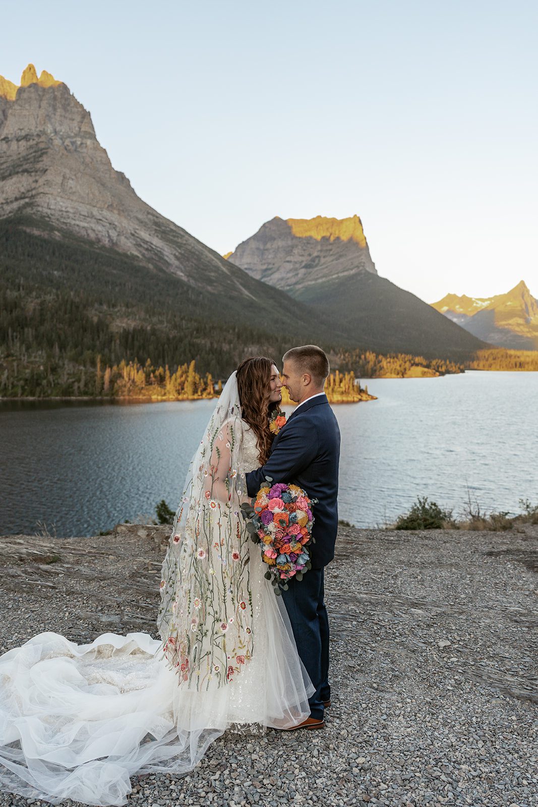 An intimate sunrise elopement at Sun Point in Glacier National Park photographed by Sydney Breann Photography