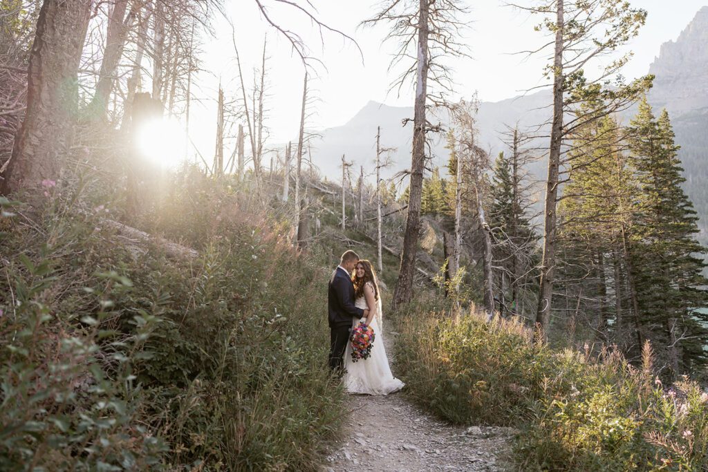 Bridal portraits at Baring Falls in Glacier National Park following an intimate ceremony at Sun Point 