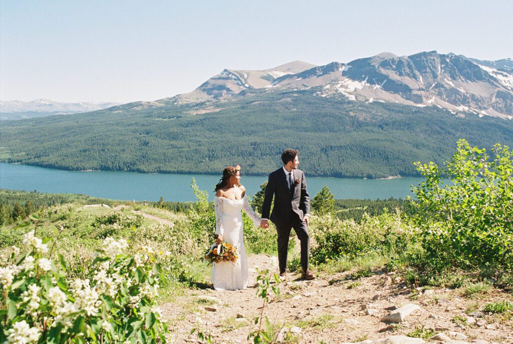 Mountain bridal portraits on a clear day in late Spring at Glacier National Park, photographed by Sydney Breann Photography. 