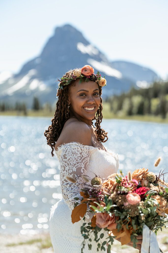 Mountain bridal portraits on a clear day in late Spring at Glacier National Park, photographed by Sydney Breann Photography. 
