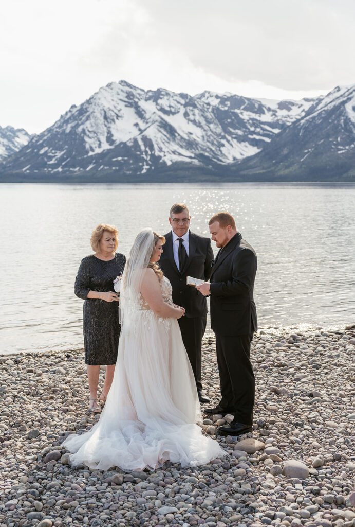 An intimate ceremony at Colter Bay Picnic Area overlooking Jackson Lake in Grand Teton National Park.