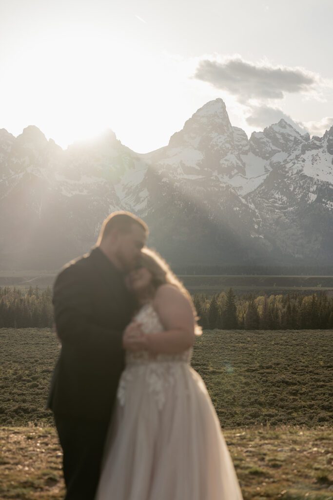 Golden hour bridal portraits at Mormon Row in Grand Teton National Park, photographed by Sydney Breann Photography.