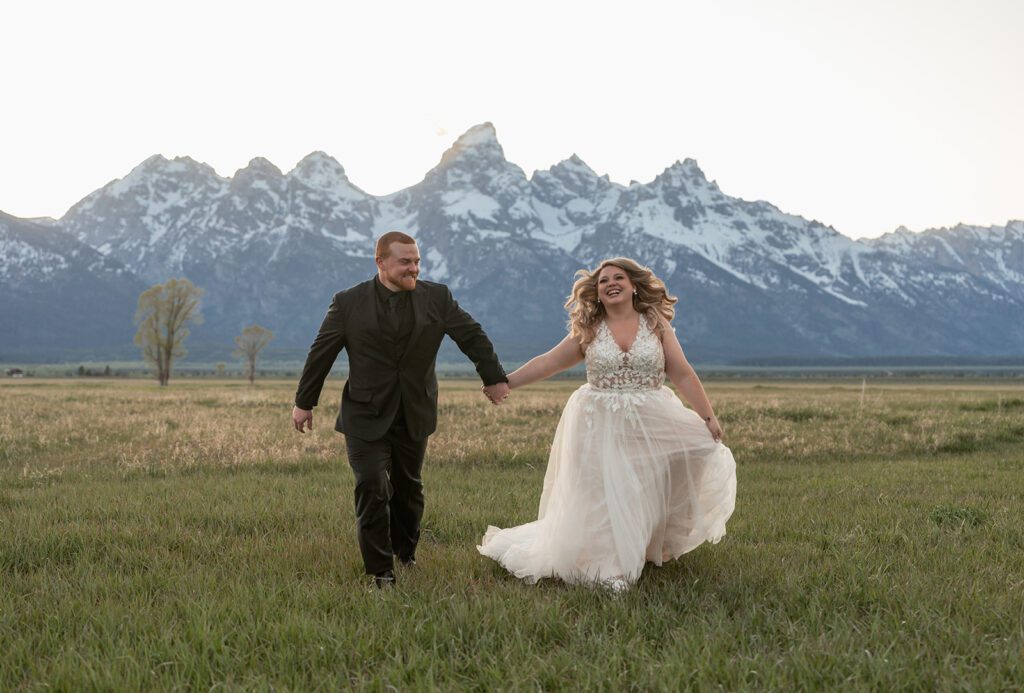 Mountain bridal portraits at Glacier View Turnout overlooking the Teton Glaciers in Grand Teton National Park, photographed by Sydney Breann Photography.