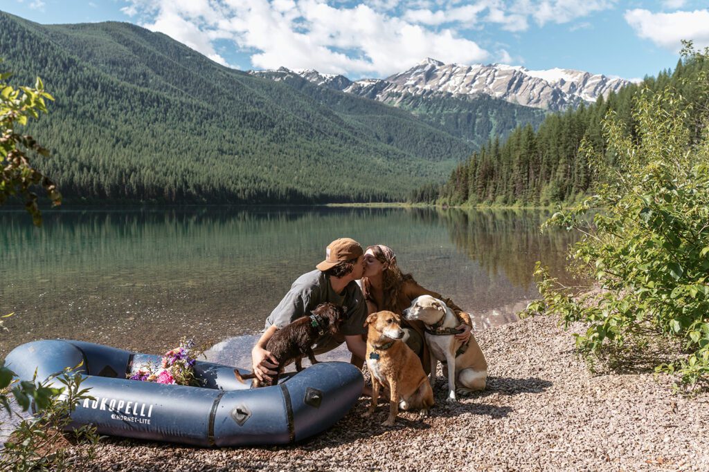 Newlyweds spend the second day of their elopement weekend hiking and swimming at Stanton Lake in Northwest Montana alongside their 3 dogs.