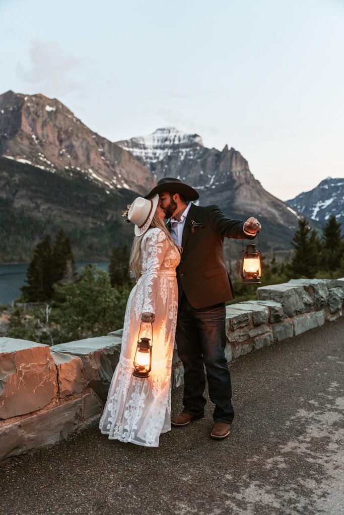 Blue hour bridal portraits with lanterns in Glacier National Park, photographed by Sydney Breann Photography. 