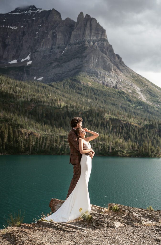 Bride and groom photos at Sun Point, overlooking St. Mary Lake 