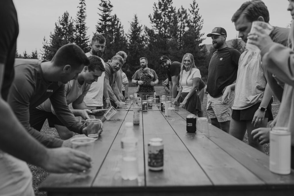 An intimate backyard wedding ends with casual yard games at a Trout Creek, Montana VRBO near Glacier National Park.