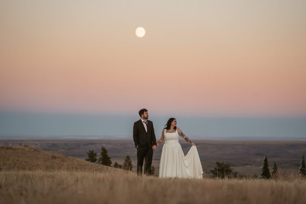 Early Fall elopement in Glacier National Park beneath a full moon